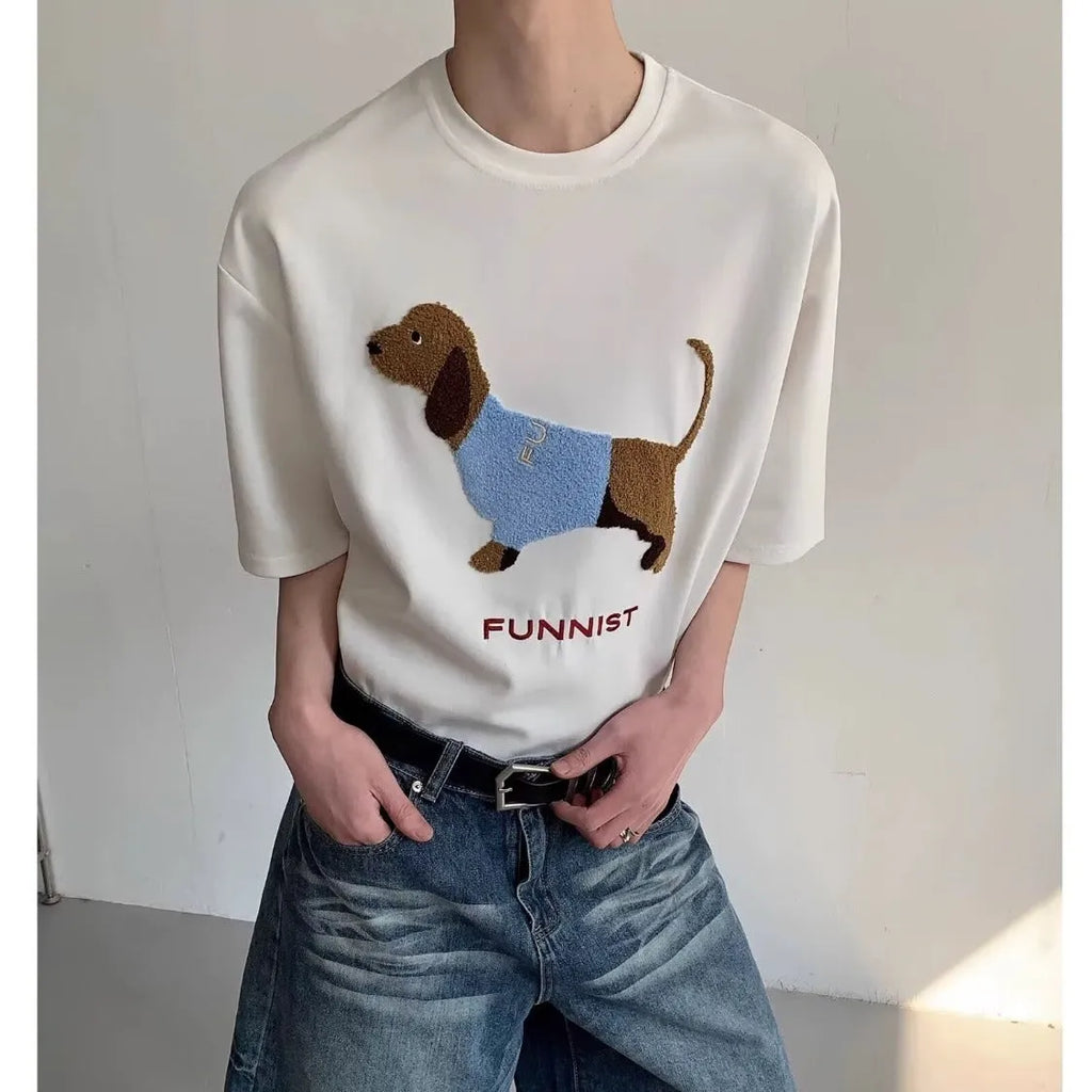 Grey men's cotton T-shirt with an embroidered cartoon dachshund holding a towel.