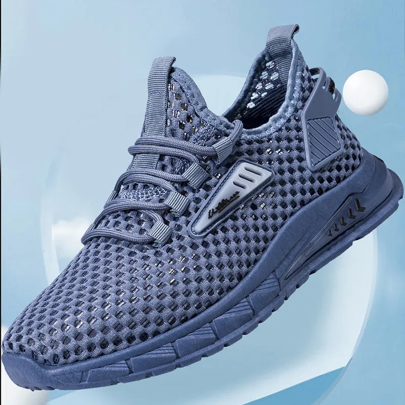 Men's beige casual sneakers with mesh lining, synthetic leather upper, and lace-up front closure