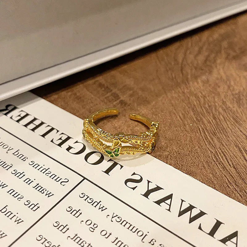 Copper women's ring featuring a creative Chinese butterfly design, available in multiple colours.