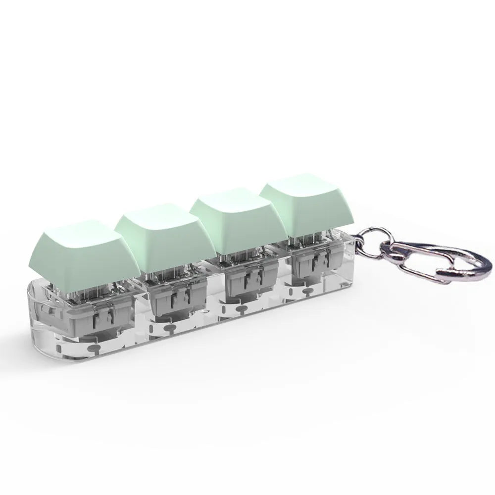 4-key mechanical keyboard switch tester with transparent bottom shell on desk