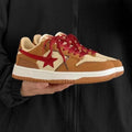 Brown women's platform sneakers with Pu leather upper, sequin details, and a lace-up front on a rubber sole.