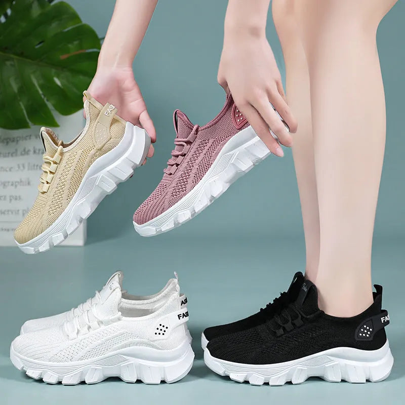 Women's breathable Flyknit sneaker with thick bottom PVC sole and round toe in white, pink, beige, or black.