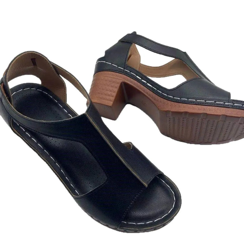 Plus size women's beige open toe wedge sandals with a buckle strap and low heel on a white background.