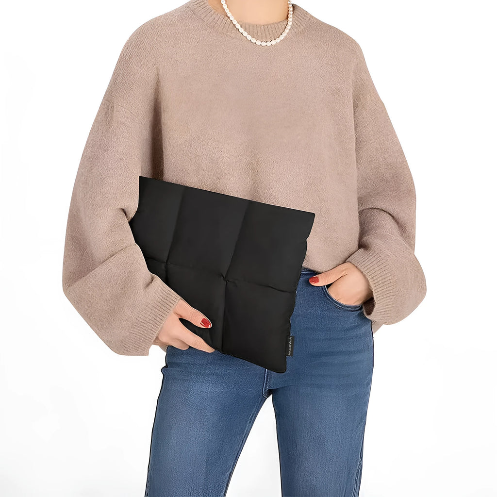 Soft fluffy polyester laptop sleeve in retro style with sewing thread detailing for 13 to 15.6 inch devices