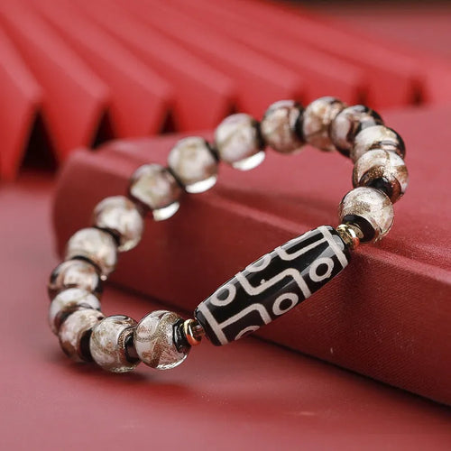 Chinese-style coloured glaze bracelet with five-colour design and Year of the Snake lucky beads.