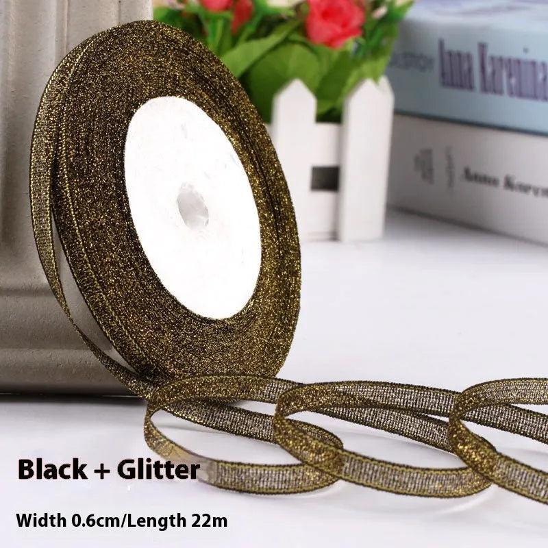 Roll of polyester gift ribbon showing 0.6cm width and multiple colour options including metallic finishes