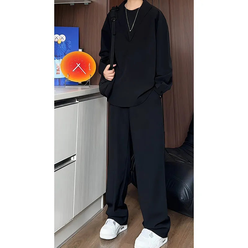 Men's black slim fit polo shirt and trousers two-piece casual suit on a hanger.