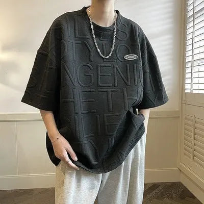 Men's black retro t-shirt with three-dimensional white letter design, loose fit short sleeve styling