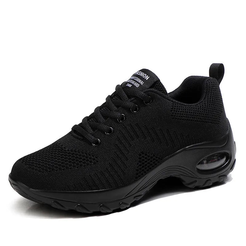 Women's red and black mesh low top sneakers with front lace-up and round toe design