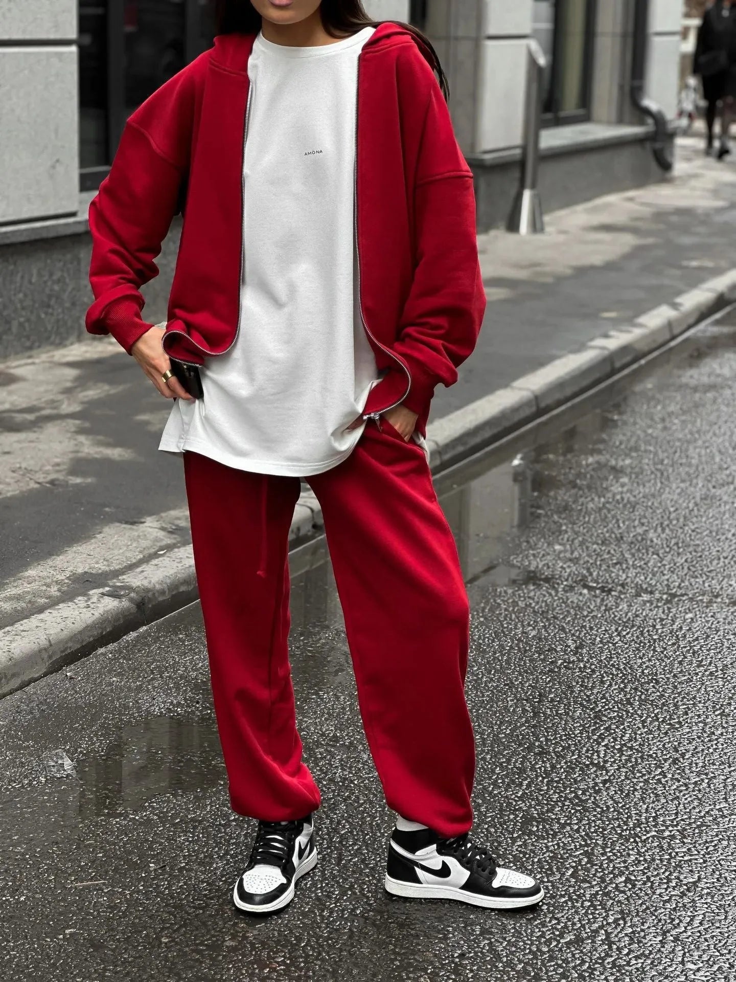 Loose fit red polyester street style coat and trousers two-piece set on a hanger