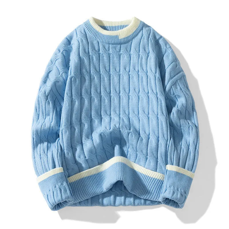 Man wearing a loose-fit long sleeve modal sweater in light blue, part of a two-piece set.