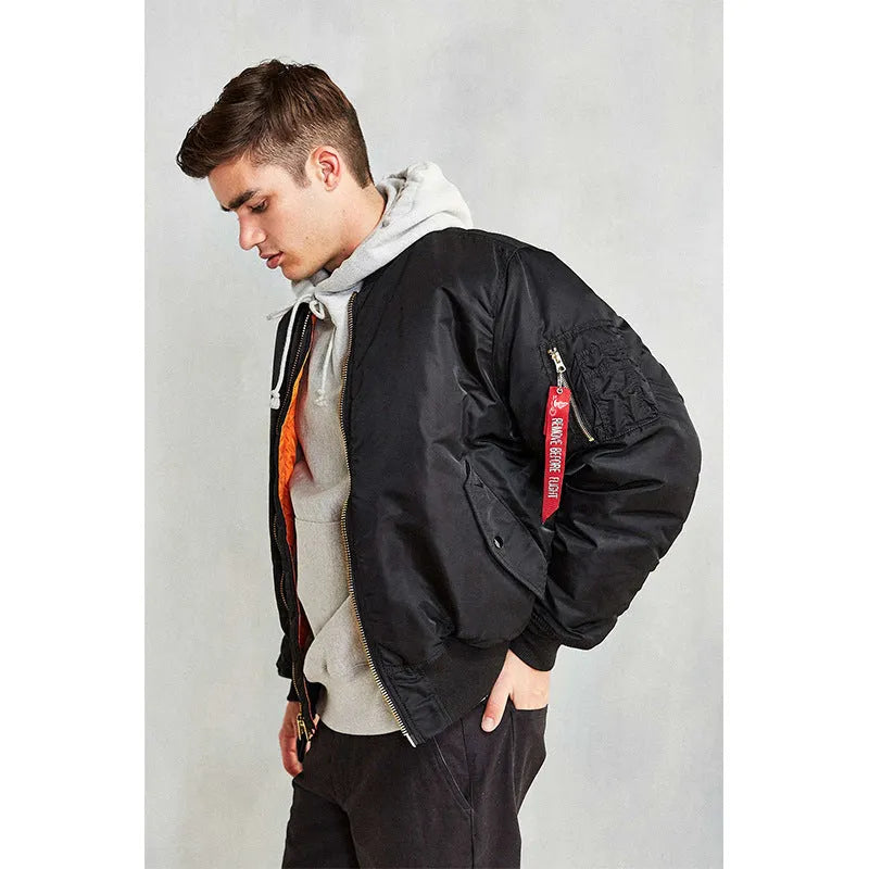 Men's loose fit pilot jacket in army green, showing cotton padding and double-sided nylon construction.