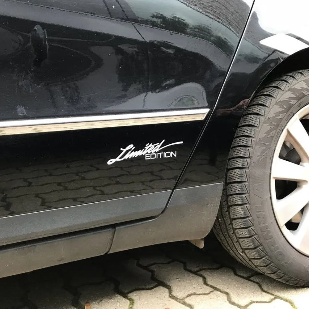 Rectangular reflective bumper sticker measuring 16cm by 3.8cm with black, white, and multicolour design options