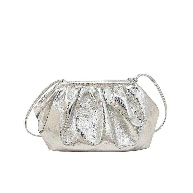 Simple hair clip shoulder crossbody bag in shell shape with sewing line details, shown in rose red colour.