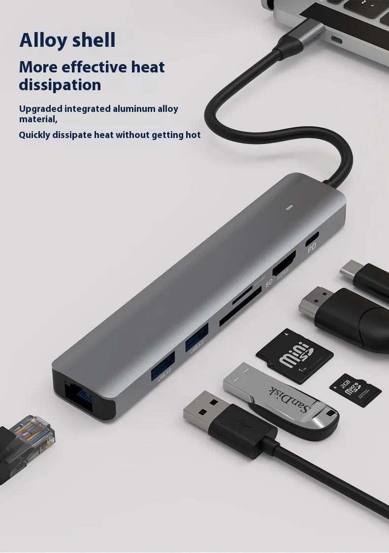 Black USB-C 7-in-1 computer hub with HDMI, USB ports and memory card slots