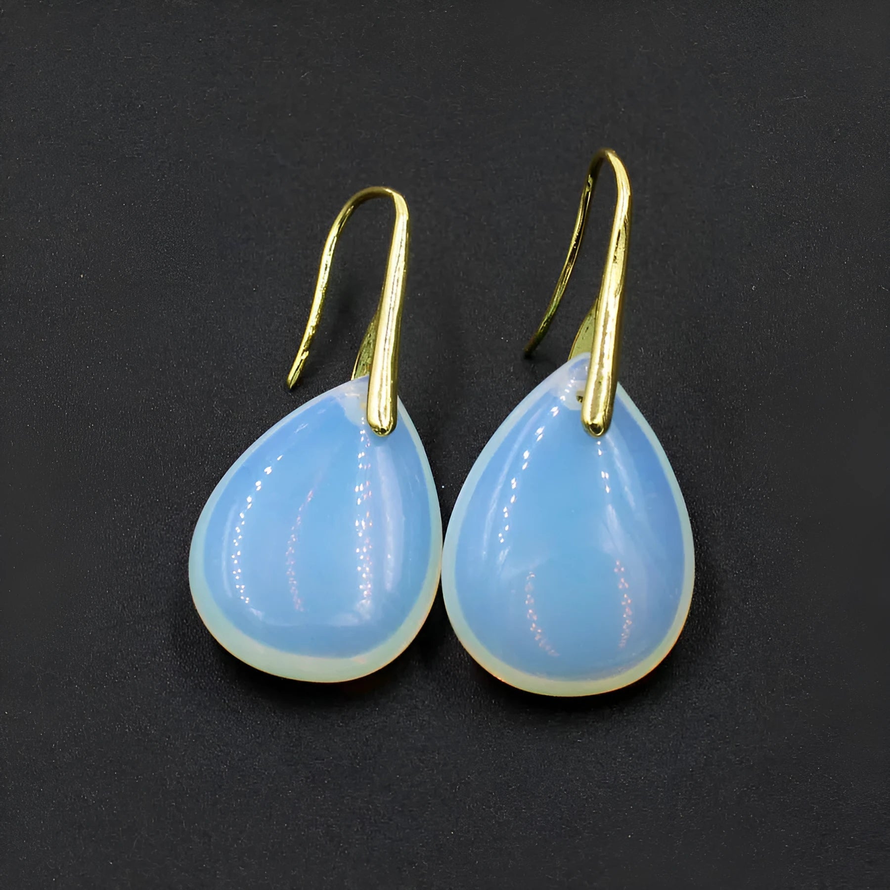 Geometric water drop crystal earrings with electroplated finish in multiple gemstone colours