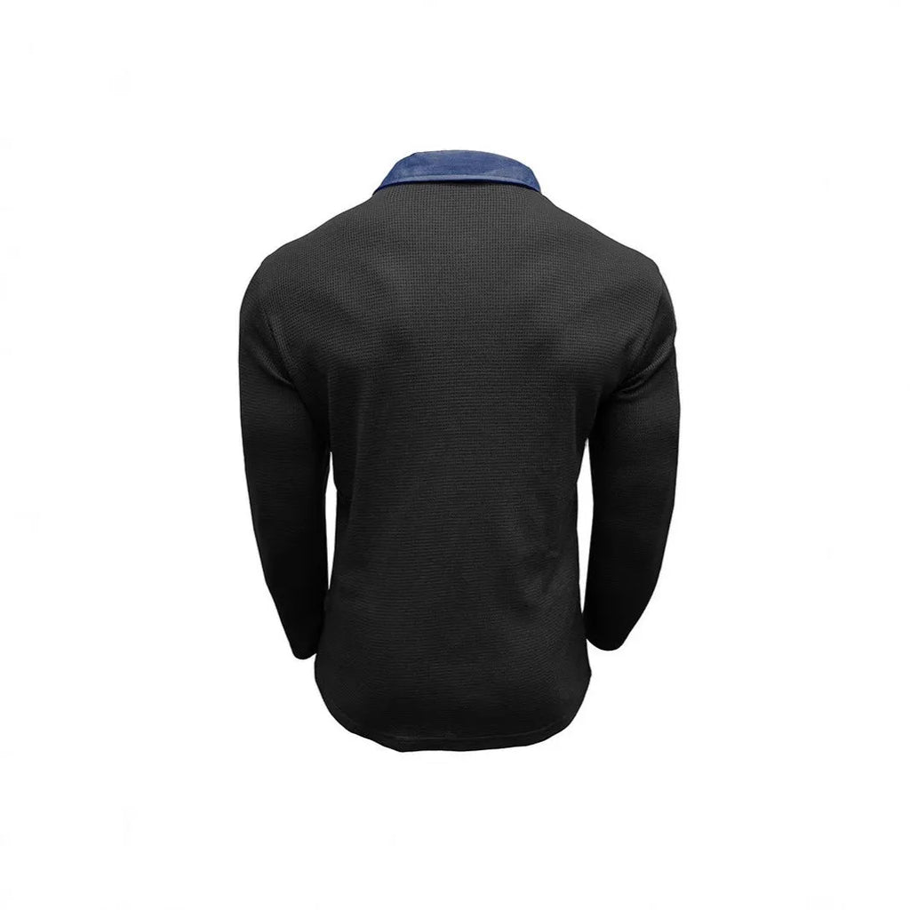Man wearing a long-sleeved waffle texture polo shirt in a loose fit, showcasing the asymmetric detail.