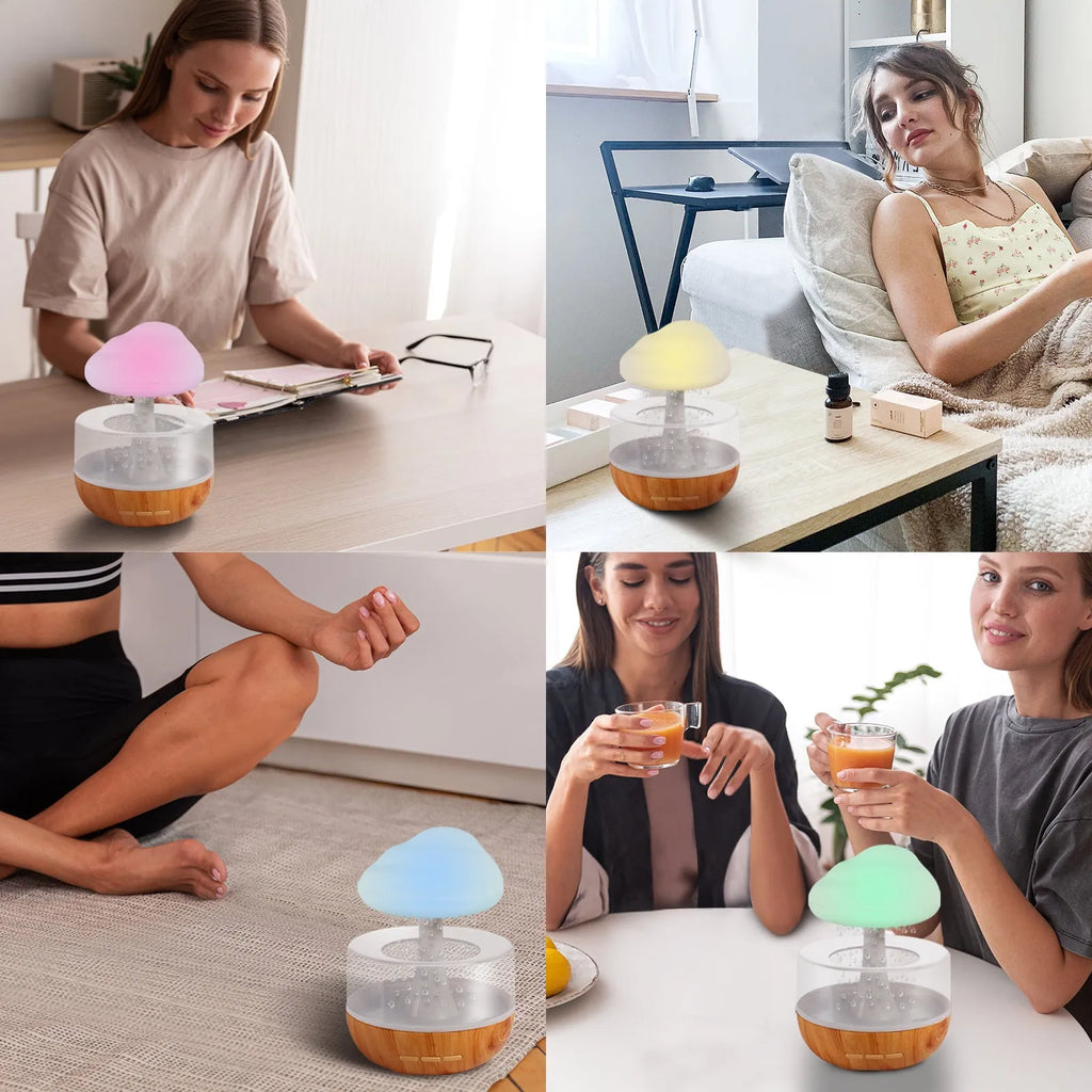 White raining cloud humidifier with night light and essential oil diffuser on table