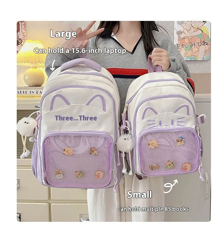 Korean cartoon large capacity nylon backpack in pink colour with badge pendant.
