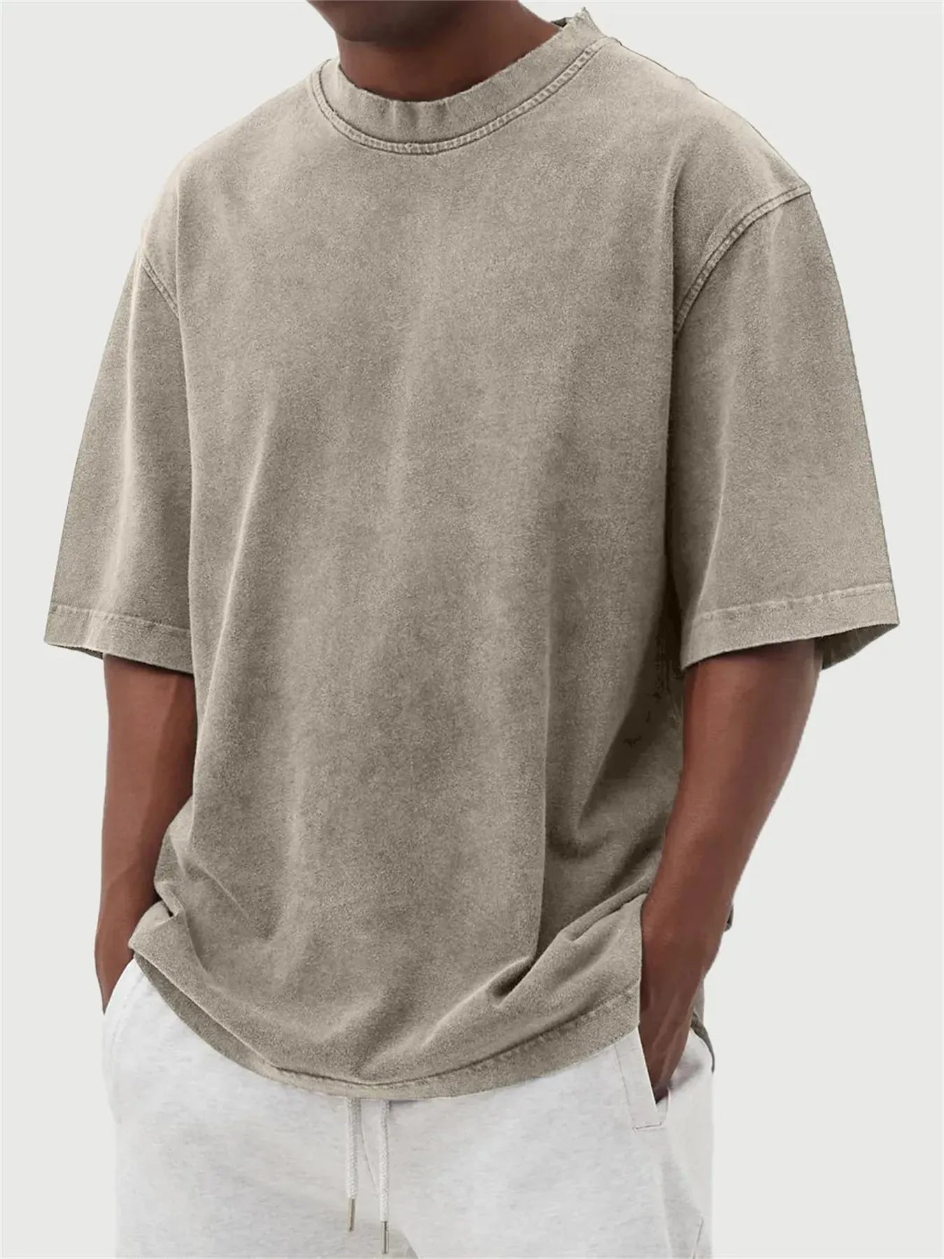 Men's stone washed distressed pullover t-shirt in loose fit with half sleeves available in eight colours