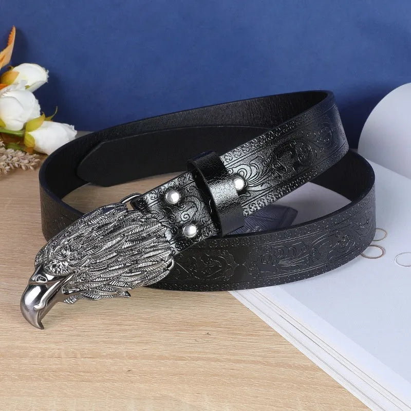 Men's brown belt with detailed cow head alloy buckle and imitation leather strap showing pin buckle closure