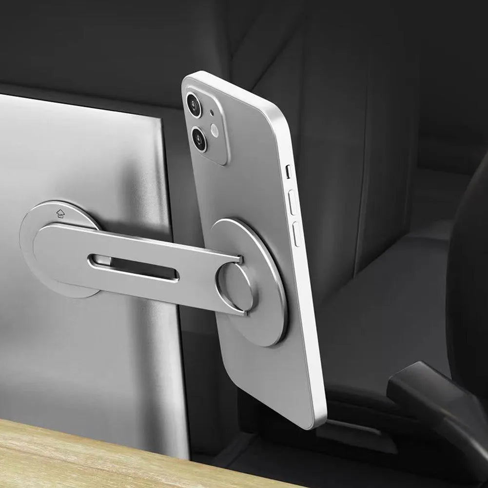 Silver aluminium alloy magnetic phone holder for car, shown next to its packaging box.