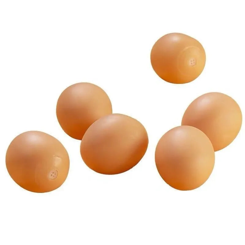 Bright coloured rubber egg-shaped dog toy with textured surface for dental cleaning