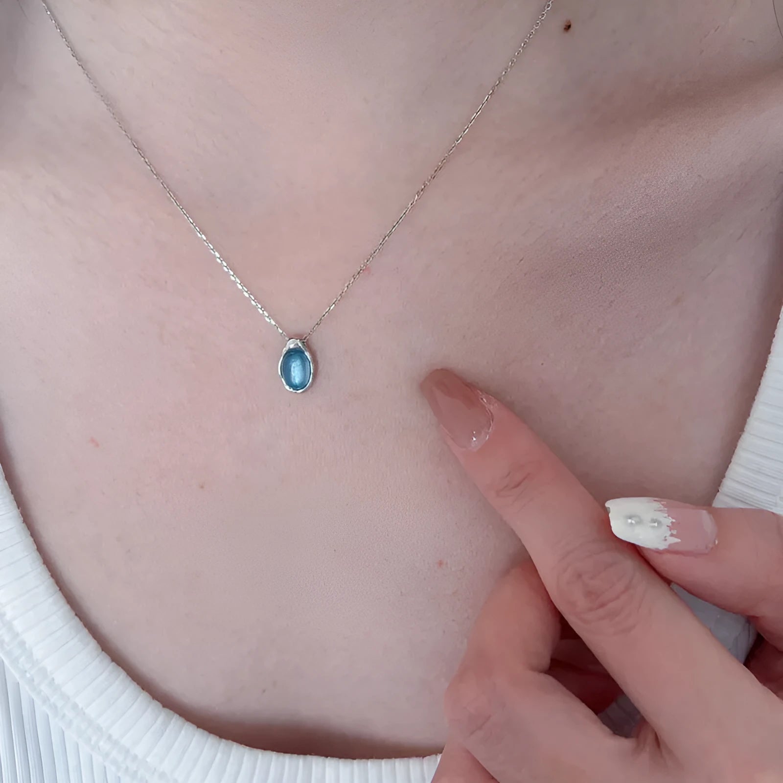 Navy blue water drop necklace pendant on adjustable cross chain, electroplated copper geometric jewellery