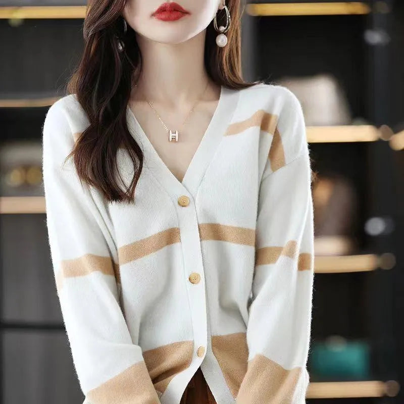 Women's striped V-neck knitted cardigan with 3D pattern in slim fit silhouette