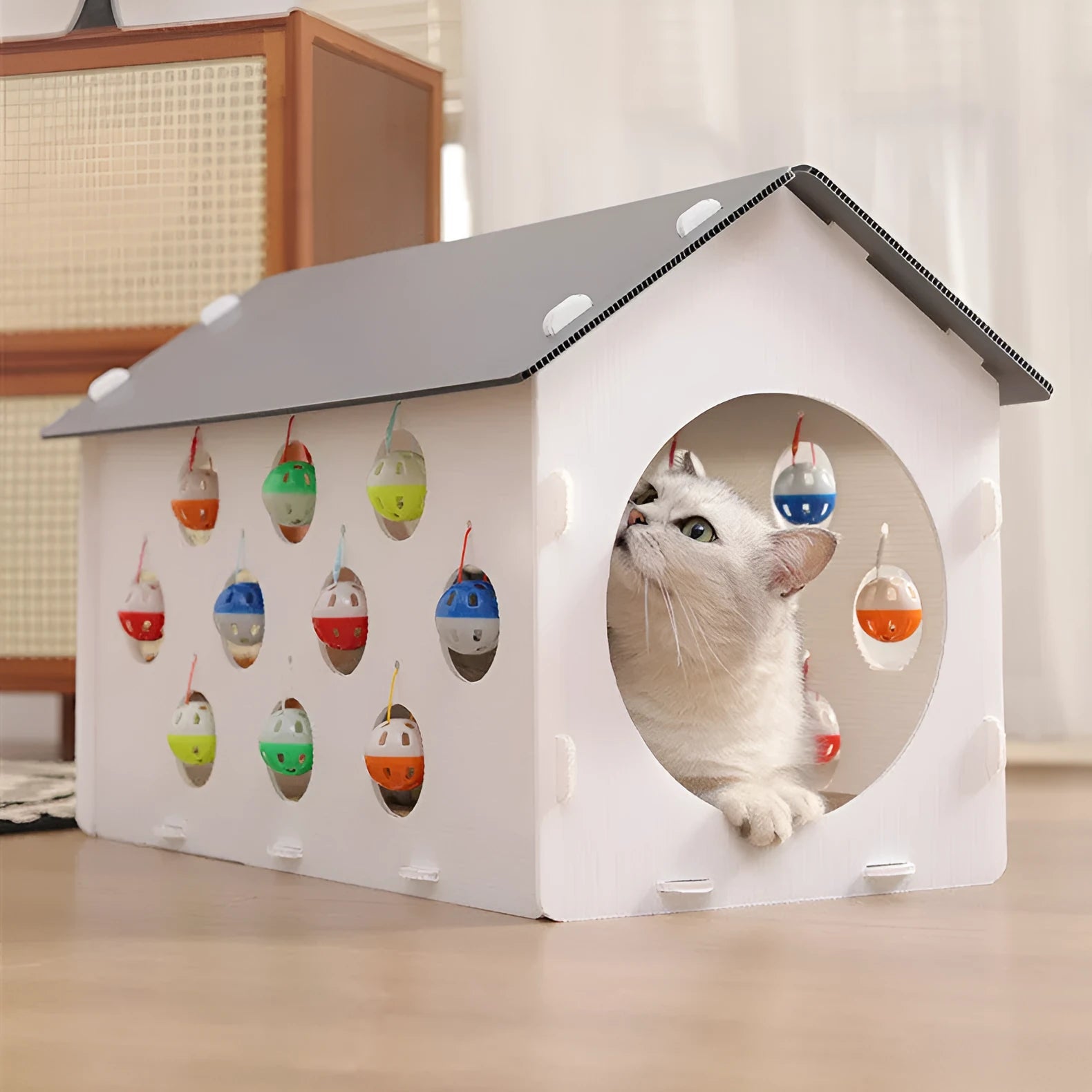 Integrated cat scratch board and nest toy with tunnel and bell ball for house cats