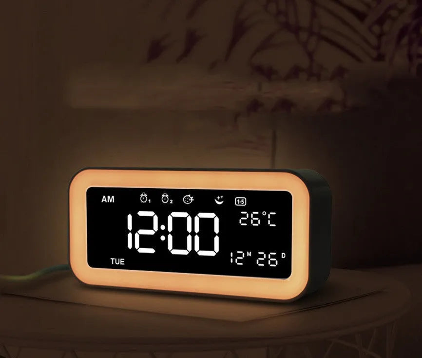 Rectangular LED digital alarm clock with multicolour ambient lighting and quartz glass display in blue colour