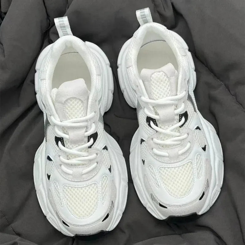 Beige mesh platform sports shoes with wedge muffin heel and lace-up front.