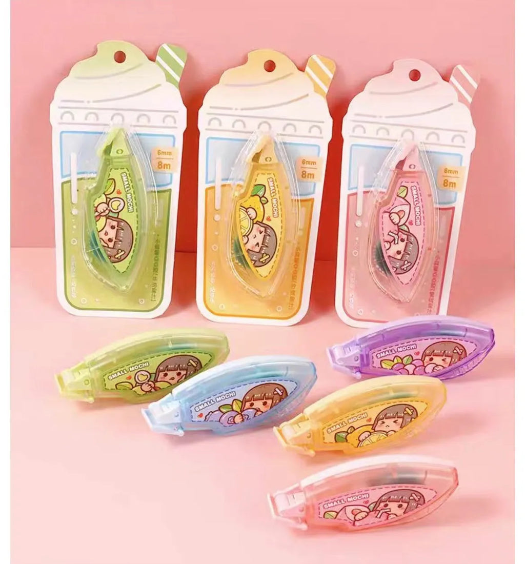 Dotting glue applicator in peach juice colour on a card, a high viscosity traceless adhesive for crafts.