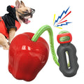 Plastic dog dental toy with dropping ball design for molar cleaning in green and red colours