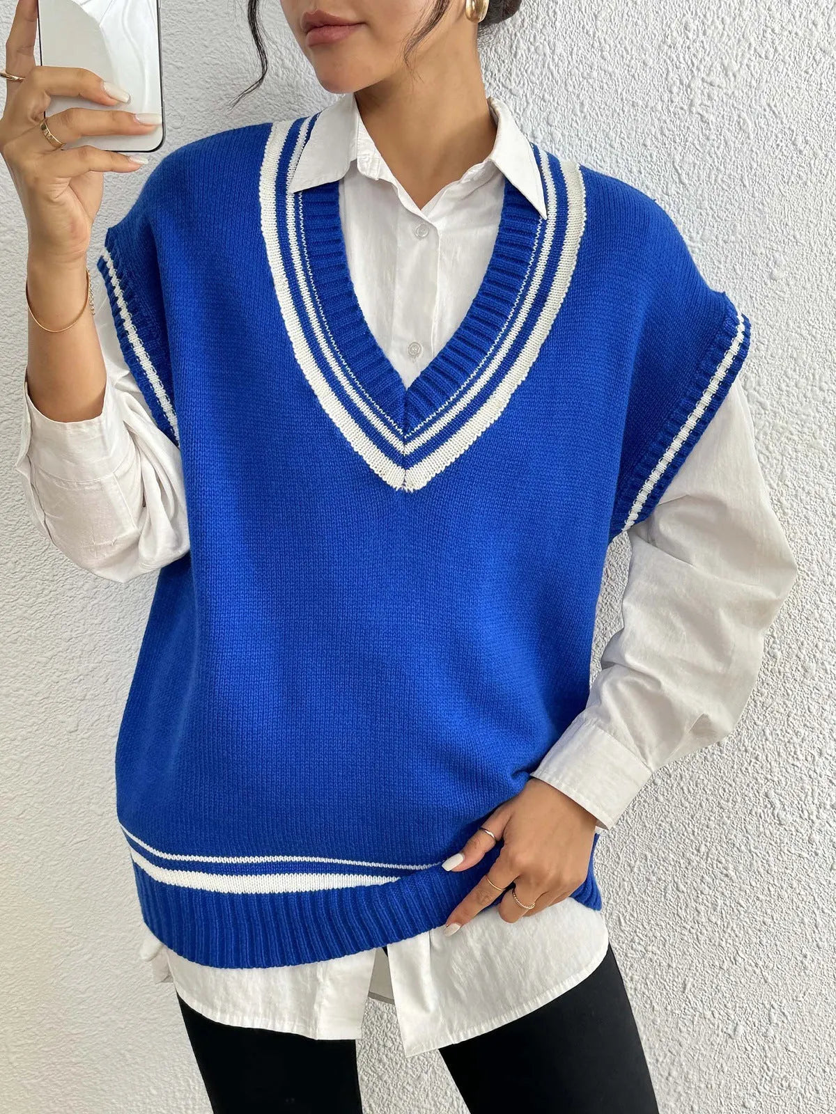 Women's loose fit college style vest sweater in acrylic polyester blend, black blue coffee colour options