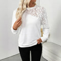 White long sleeve pullover top with flower pattern and regular sleeves in loose fit