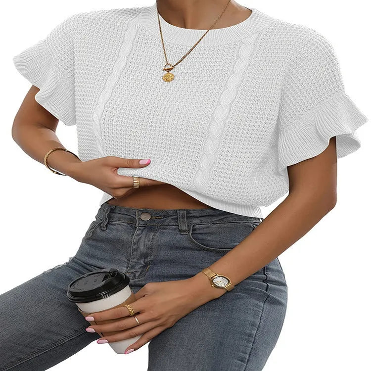 Loose white knitted pullover sweater with detailed twisted string ruffled short sleeves, round neck.