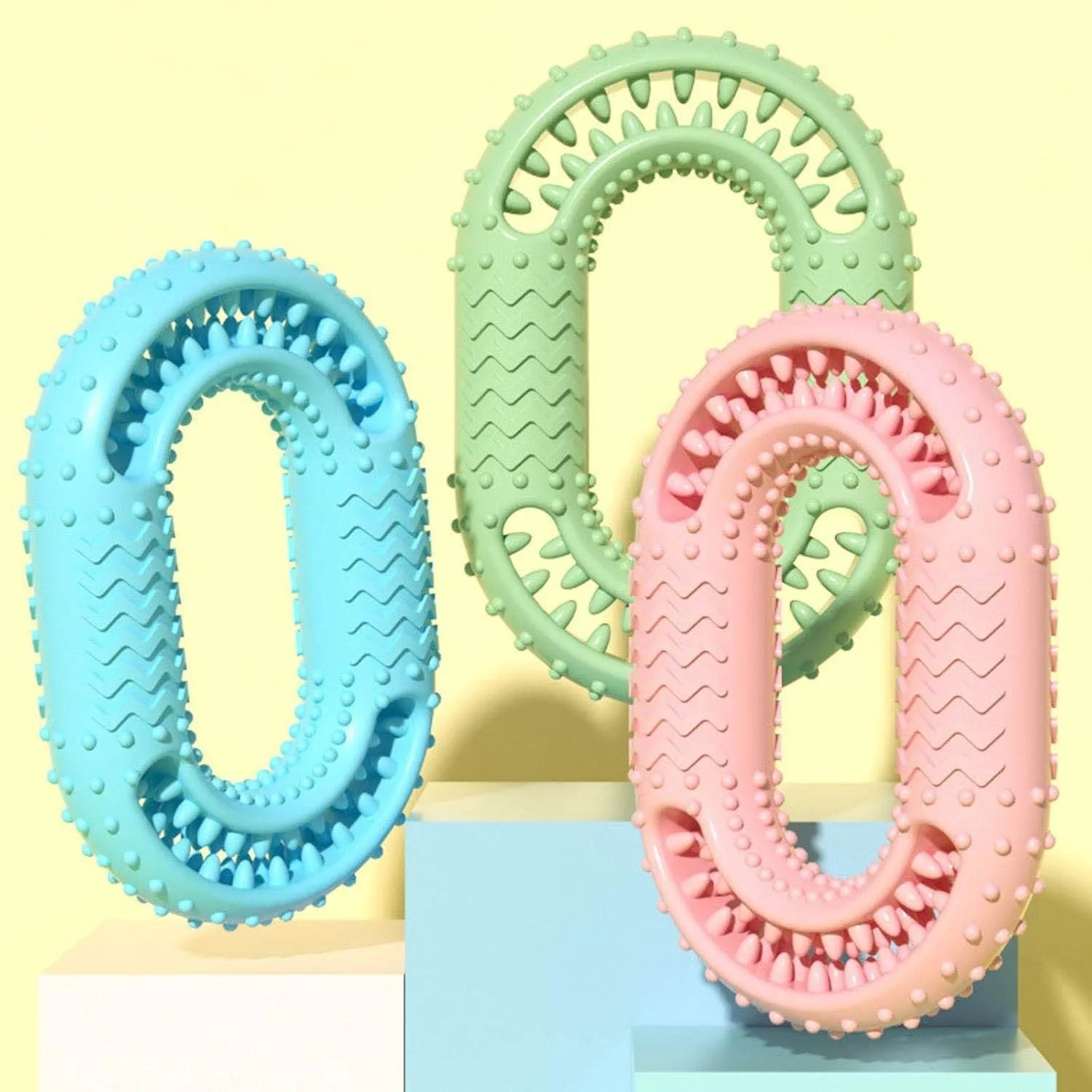 Blue O-ring shaped dog chew toy for aggressive chewers on a plain background.