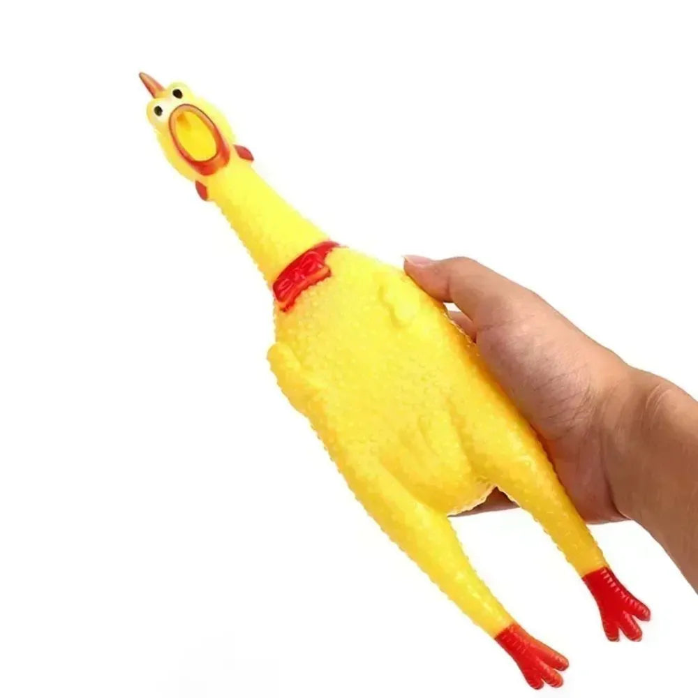 Yellow rubber squeaking chicken dog toy available in multiple sizes for pet chewing and play