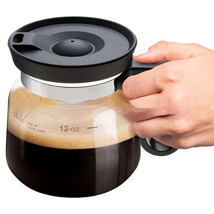 Transparent borosilicate glass coffee maker with blue silicone cover for pour-over brewing