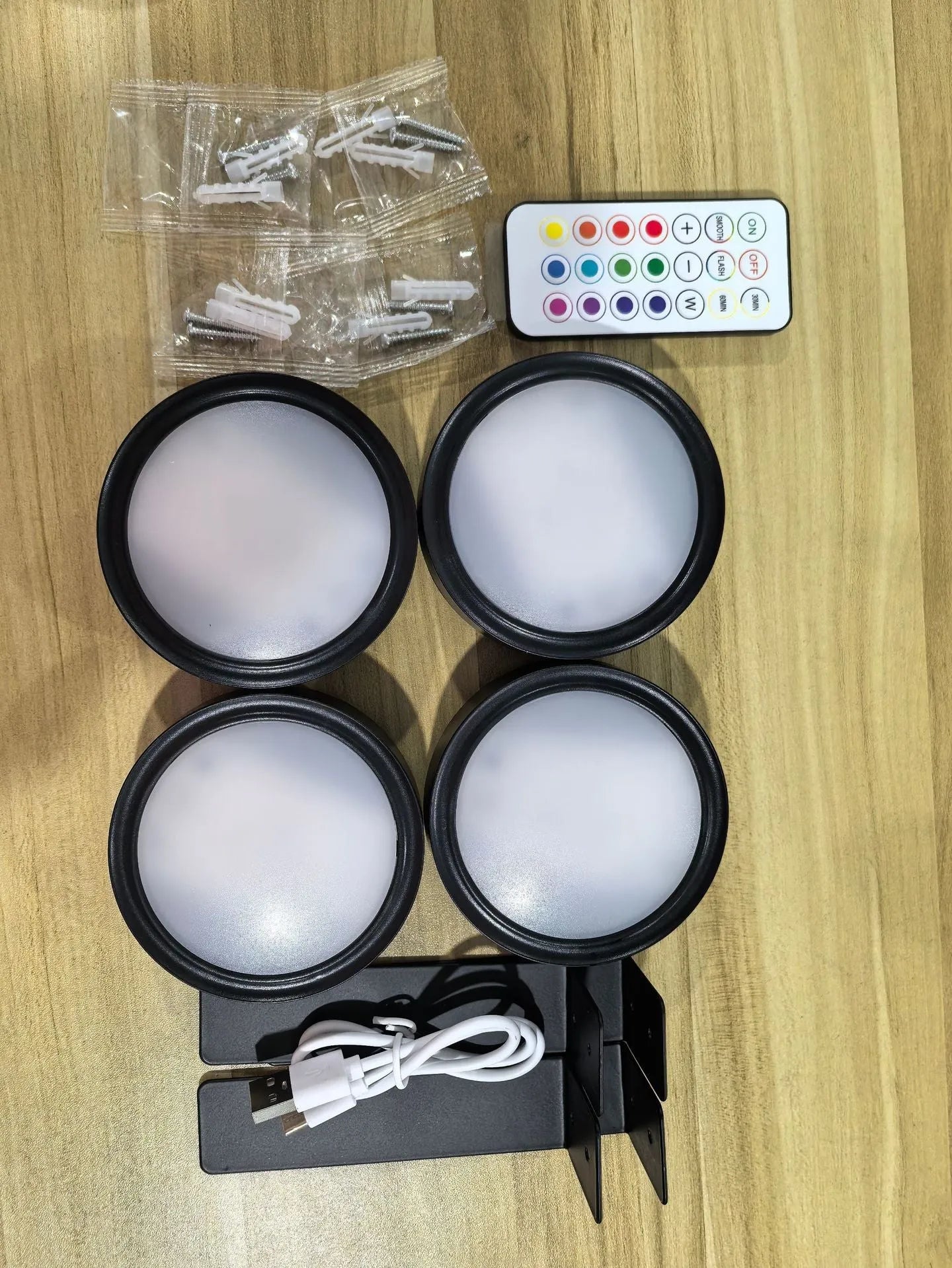 Wireless LED painting lamp with magnetic charging and remote control in black, white or gold finish