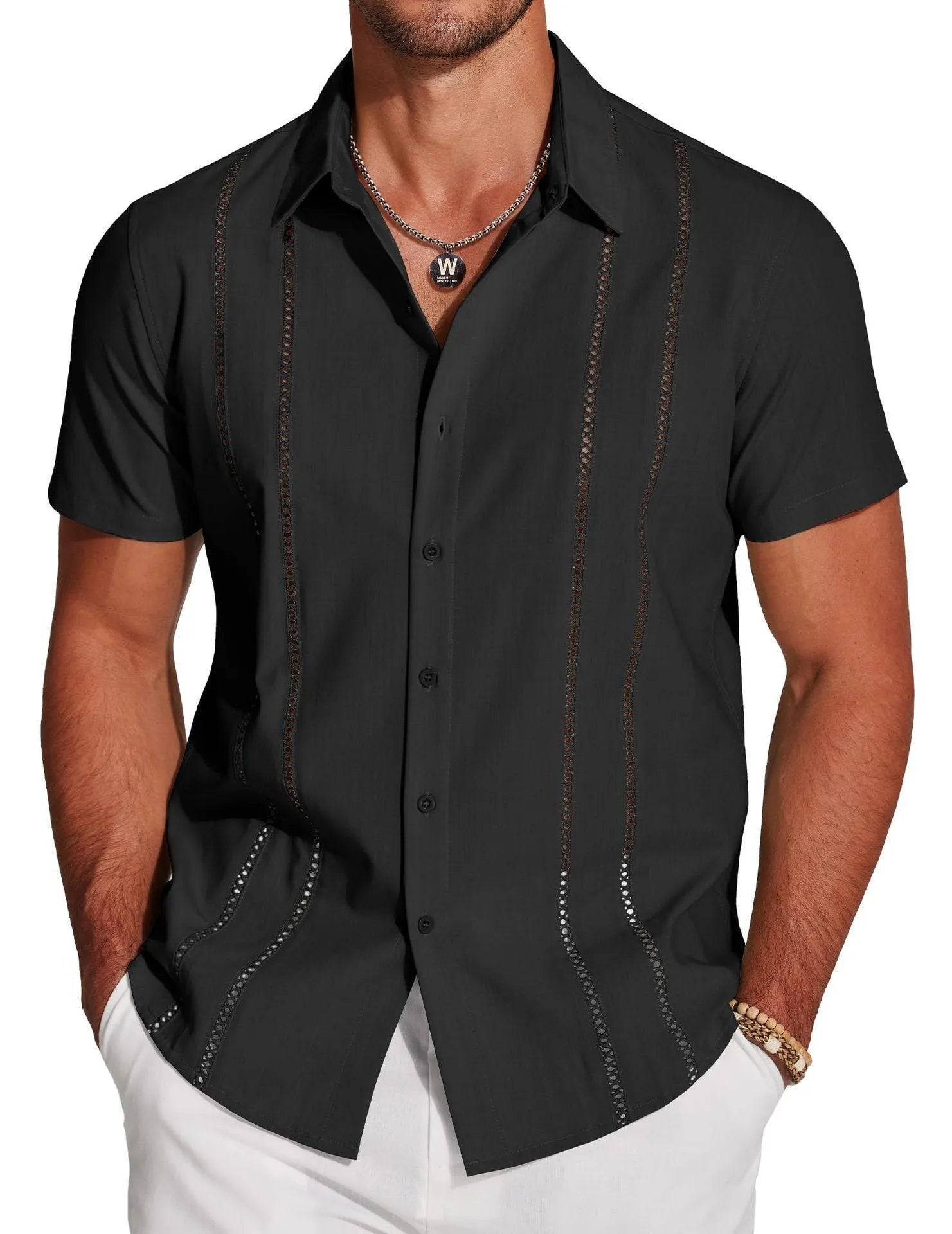 Man wearing a slim fit, short sleeve Hawaiian shirt with a colourful digital print pattern.