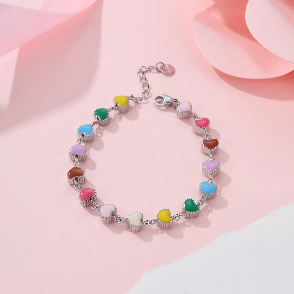 Heart-shaped stainless steel bracelet with colourful oil pattern in gold or steel finish
