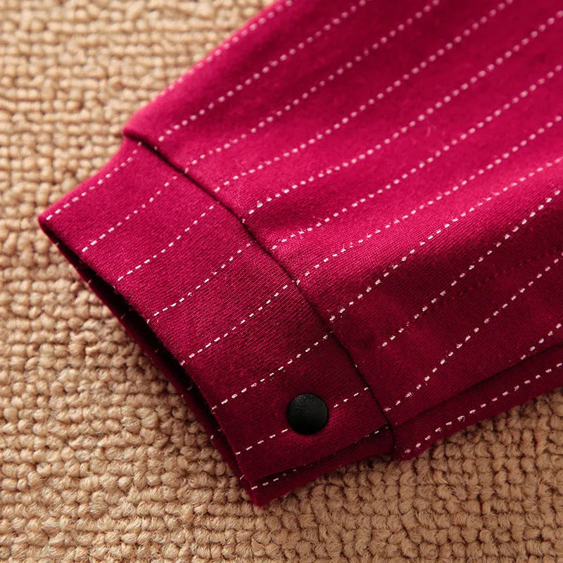 Wine red cotton baby boy romper suit with long sleeves and single-breasted buttons.
