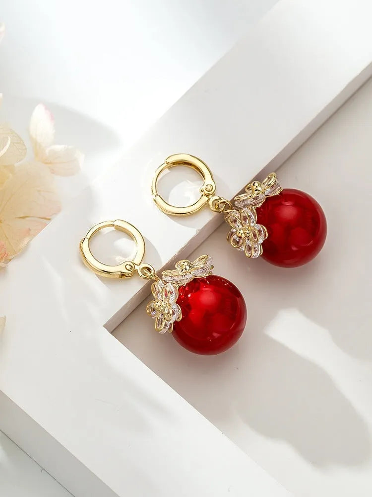 Women's zircon earrings with electroplated finish in geometric rose designs on copper