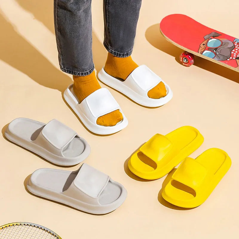 Thick sole EVA flip flop slippers in multiple colours on a white background.
