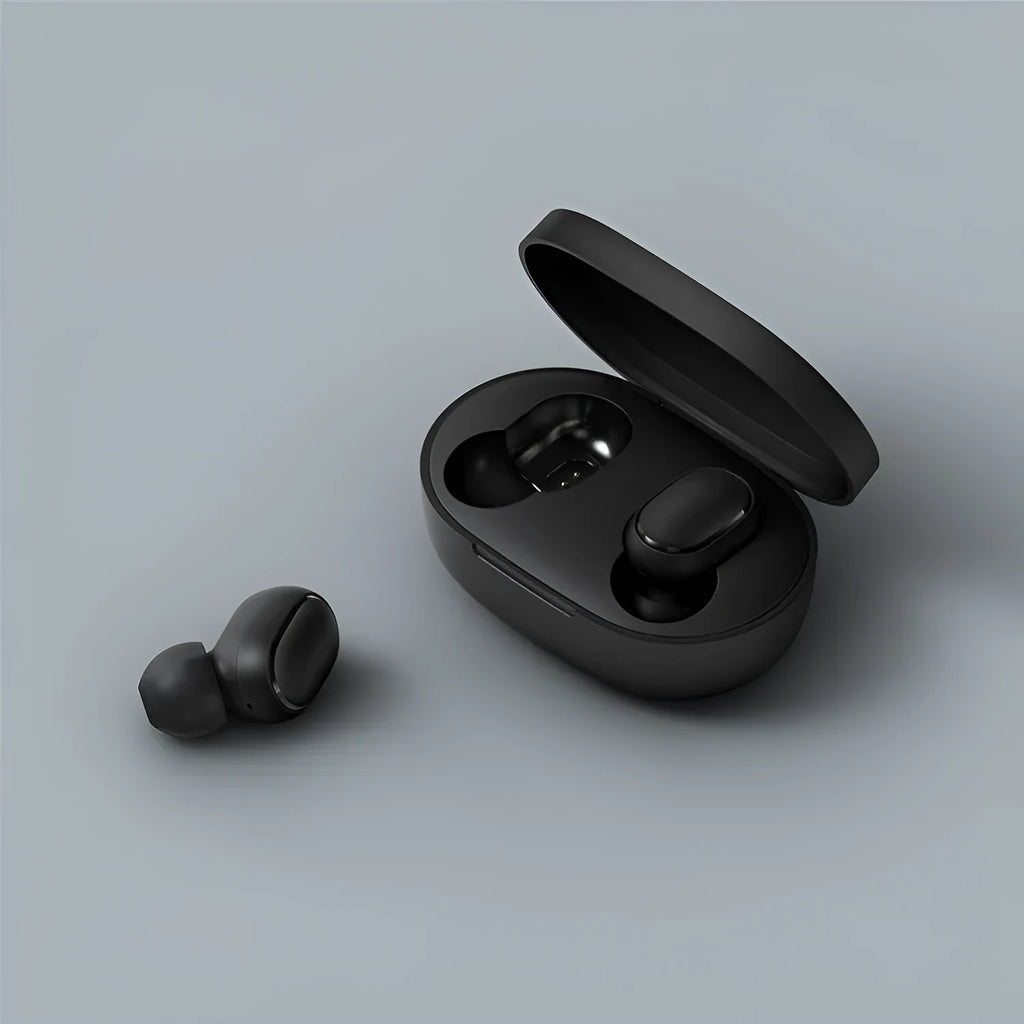 Redmi AirDots Black true wireless earbuds and their white charging case on a table