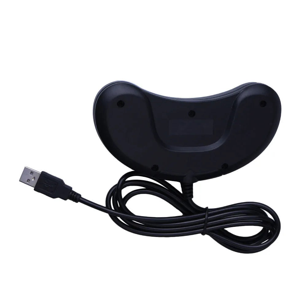 Black Sega USB computer game controller with 1.8m cable on a desk.
