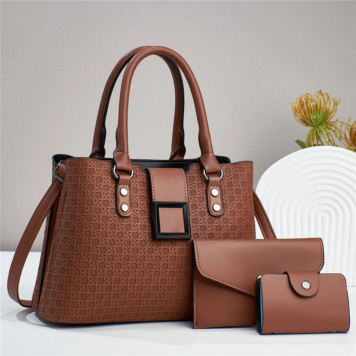 Three-piece women's crossbody bag in textured PU with square shape and open pocket