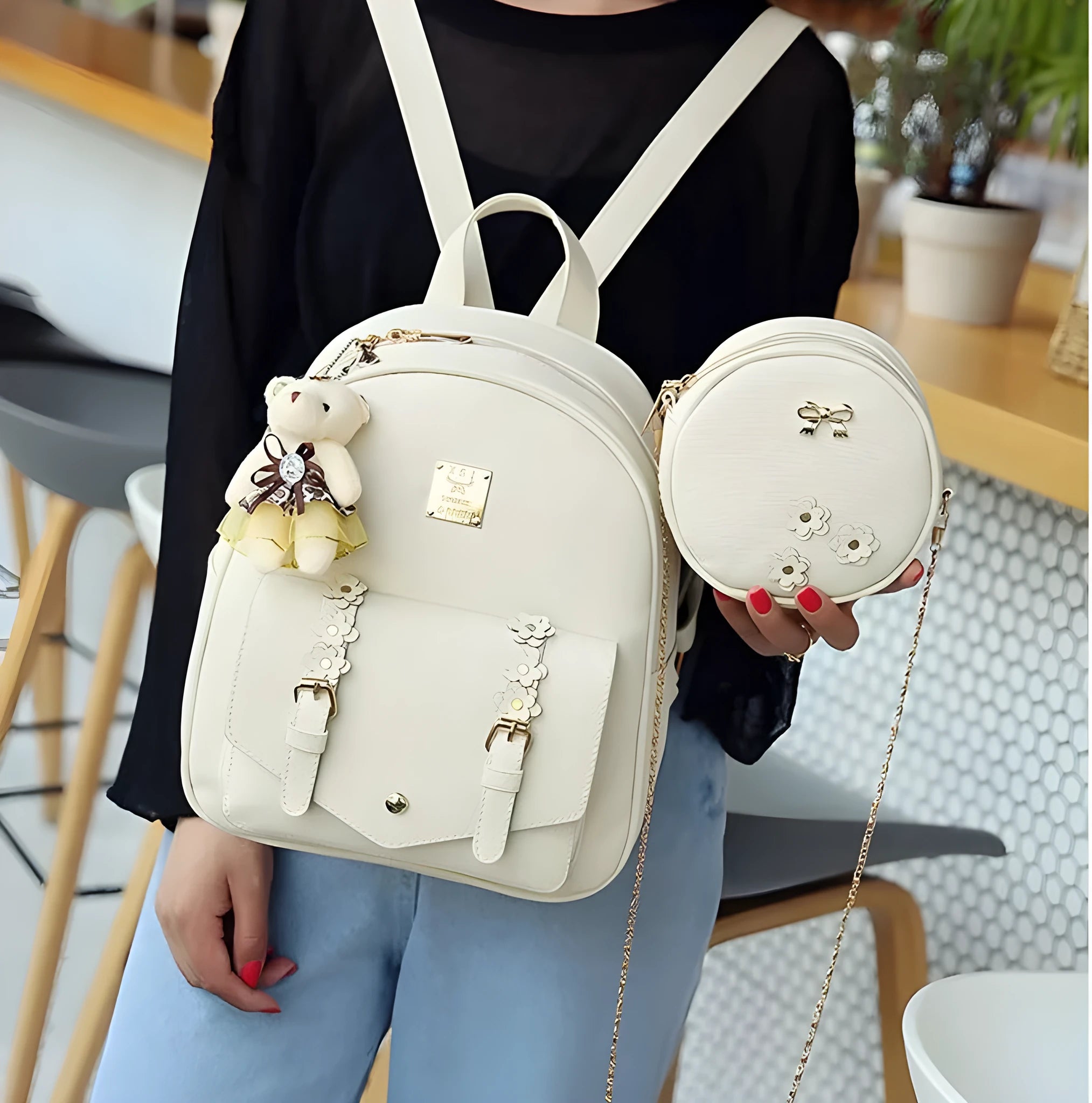 Three-piece women's bag set showing backpack, shoulder bag, and card wallet in matching colour